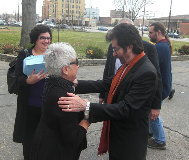 George visits with the family of his Godfather
